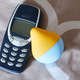 Two vibrators. The Nokia 3310 and the Iroha Mini by Tenga.